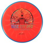This is a red Axiom Fission Proxy disc golf putter with the commemorative stamp showcasing Simon Lizotte's historic win!